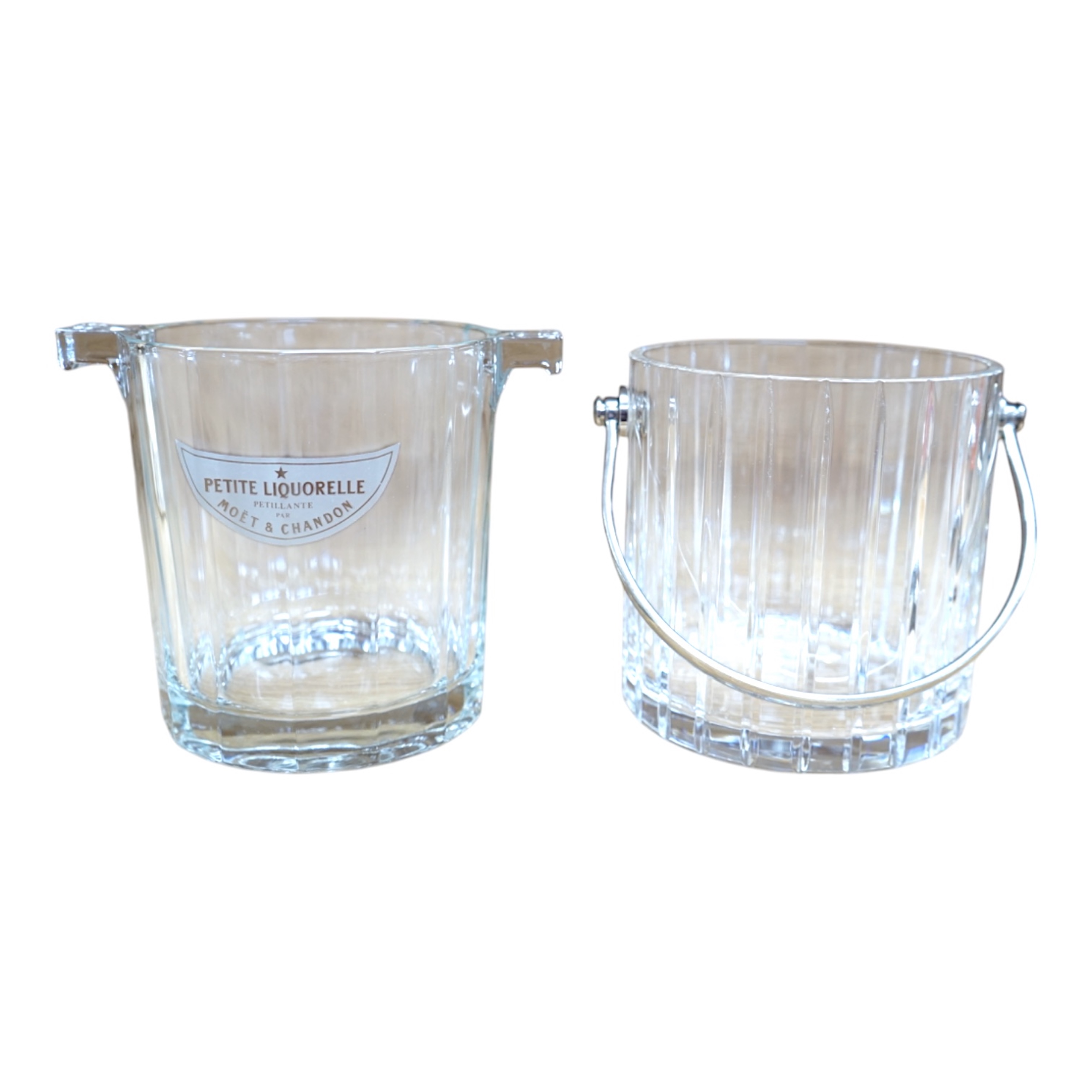 A Baccarat glass ice bucket, and a similar Moet & Chandon example, tallest 13cm. Condition - good.